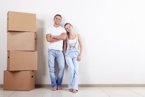 Professional packers organising household items in a Camdentown home