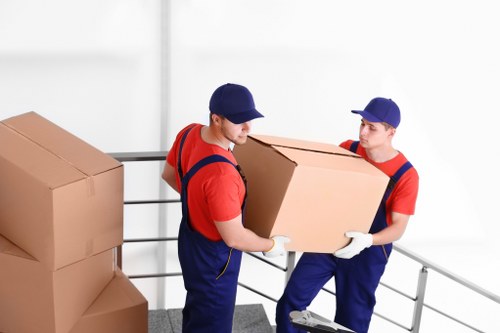 Team handling furniture for a flat move in Camdentown