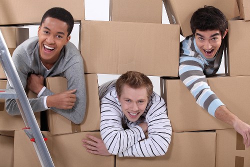 Boxes and furniture being prepared for house removals