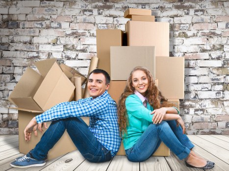 Local moving team handling boxes and household items