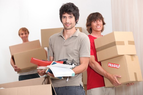 Careful wrapping and labelling of boxes for a move in Camdentown